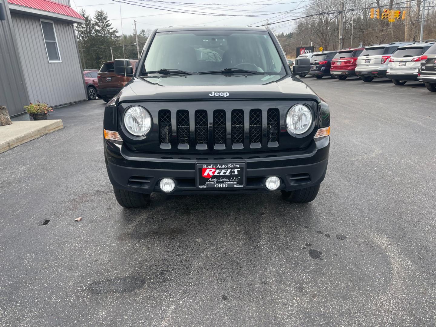 2017 Black /Black Jeep Patriot Latitude 4WD (1C4NJRFB5HD) with an 2.4L I4 DOHC 16V engine, 6-Speed Automatic transmission, located at 11115 Chardon Rd. , Chardon, OH, 44024, (440) 214-9705, 41.580246, -81.241943 - This 2017 Jeep Patriot Latitude with 4WD and only 55,000 miles on the odometer. This SUV comes equipped with a 2.4L engine for powerful performance. It features a comfortable and spacious interior with modern amenities. The 4WD capability ensures that you can handle any terrain or weather conditions - Photo#1